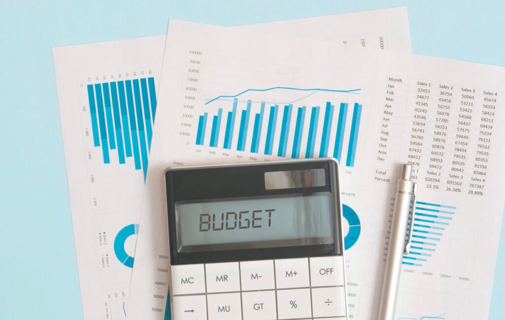 Business graphs, charts and calculator on table. Financial development, Banking Account, Statistics