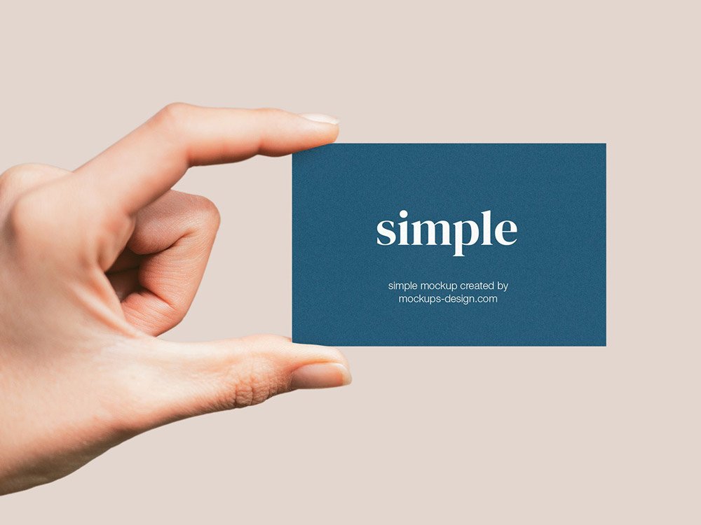 Hand Holding Business Card Mockup PSD