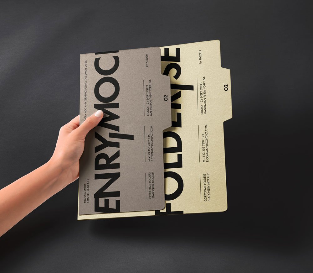 Hand Holding Folder Mockup